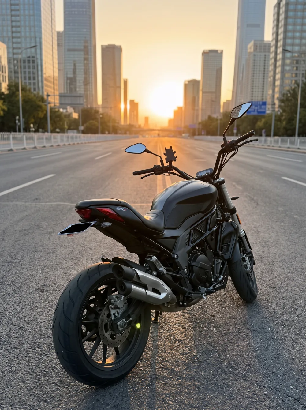 A motorcycle in the city at sunset